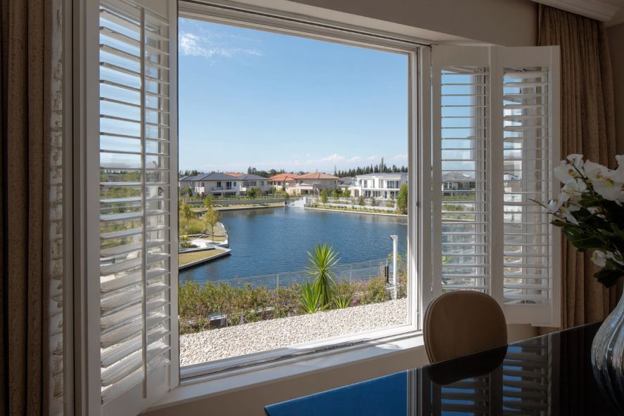 Interior shutters on metal windows